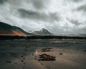 Preview wallpaper mountain, coast, sand, footprints, landscape