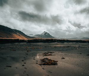 Preview wallpaper mountain, coast, sand, footprints, landscape