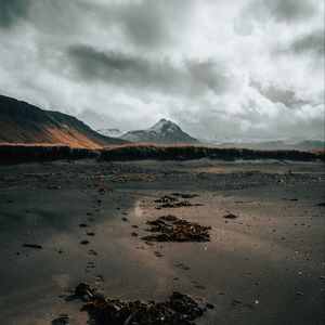 Preview wallpaper mountain, coast, sand, footprints, landscape