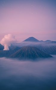 Preview wallpaper mountain, fog, clouds, mount bromo, indonesia