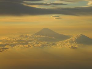 Preview wallpaper mountain, fog, clouds, summit, sky