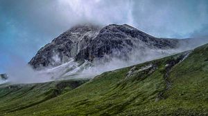 Preview wallpaper mountain, fog, slope, grass