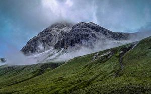 Preview wallpaper mountain, fog, slope, grass