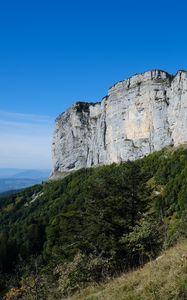 Preview wallpaper mountain, foothills, cliff, trees, landscape