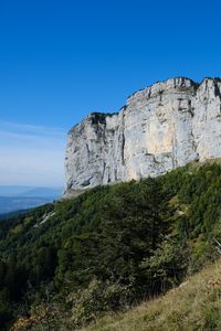 Preview wallpaper mountain, foothills, cliff, trees, landscape