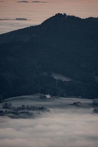 Preview wallpaper mountain, forest, fog, clouds, buildings, aerial view