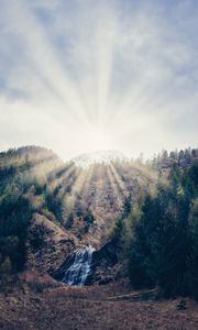 Preview wallpaper mountain, forest, sunlight, bright, slope, waterfall