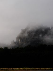 Preview wallpaper mountain, fortress, fog, forest, nature