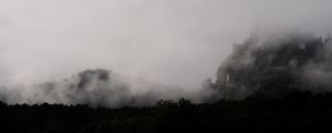 Preview wallpaper mountain, fortress, fog, forest, nature