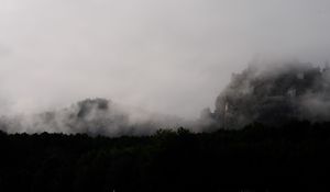 Preview wallpaper mountain, fortress, fog, forest, nature