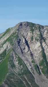 Preview wallpaper mountain, grass, rock, relief, slope