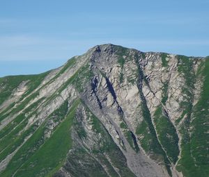 Preview wallpaper mountain, grass, rock, relief, slope
