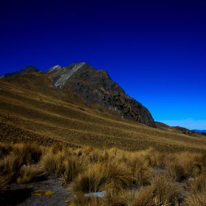 Preview wallpaper mountain, grass, sky, mexico