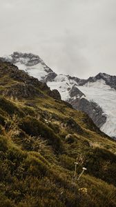 Preview wallpaper mountain, grass, snow, hill