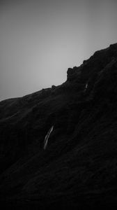 Preview wallpaper mountain, grass, waterfall, black and white