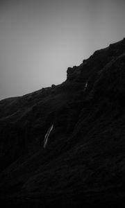Preview wallpaper mountain, grass, waterfall, black and white