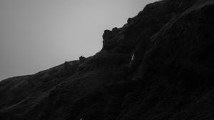 Preview wallpaper mountain, grass, waterfall, black and white