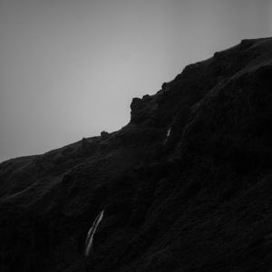 Preview wallpaper mountain, grass, waterfall, black and white