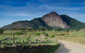 Preview wallpaper mountain, hill, pathway, fence