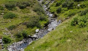 Preview wallpaper mountain, hill, stream, stones, grass, nature