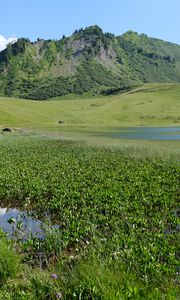 Preview wallpaper mountain, hill, valley, grass, landscape, nature