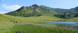 Preview wallpaper mountain, hill, valley, grass, landscape, nature