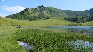 Preview wallpaper mountain, hill, valley, grass, landscape, nature