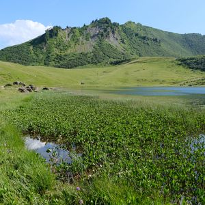 Preview wallpaper mountain, hill, valley, grass, landscape, nature