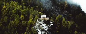 Preview wallpaper mountain, house, slope, rock, trees