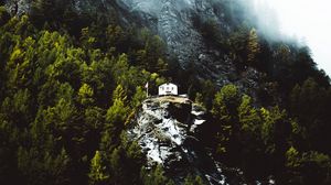 Preview wallpaper mountain, house, slope, rock, trees