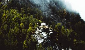 Preview wallpaper mountain, house, slope, rock, trees