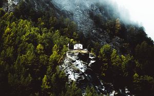 Preview wallpaper mountain, house, slope, rock, trees