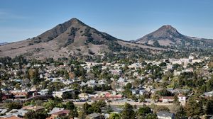 Preview wallpaper mountain, houses, buildings, trees
