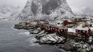 Preview wallpaper mountain, houses, sea, waves, shore