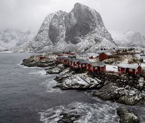 Preview wallpaper mountain, houses, sea, waves, shore