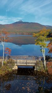 Preview wallpaper mountain, lake, bridge, trees, autumn, landscape