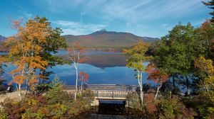 Preview wallpaper mountain, lake, bridge, trees, autumn, landscape
