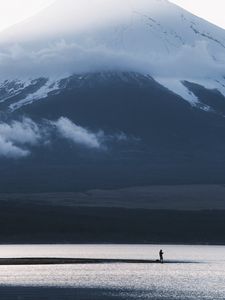 Preview wallpaper mountain, lake, fisherman, silhouette