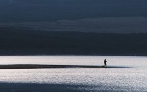 Preview wallpaper mountain, lake, fisherman, silhouette
