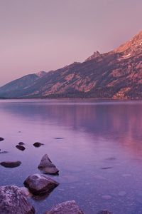 Preview wallpaper mountain, lake, reflection, stones, coast, sky, gray