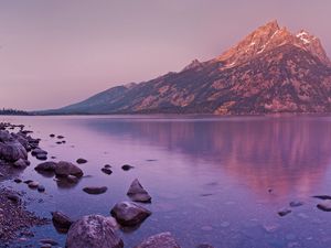 Preview wallpaper mountain, lake, reflection, stones, coast, sky, gray