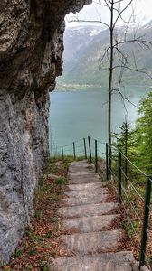 Preview wallpaper mountain, lake, rock, slope, steps, trees