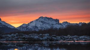 Preview wallpaper mountain, lake, snow, sunset, dusk
