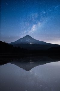 Preview wallpaper mountain, lake, starry sky, twilight, reflection