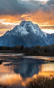 Preview wallpaper mountain, lake, sunset, sky, clouds, peak, landscape