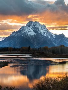 Preview wallpaper mountain, lake, sunset, sky, clouds, peak, landscape