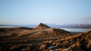 Preview wallpaper mountain, landscape, grass, distance