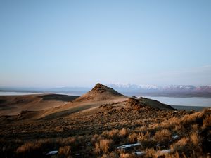 Preview wallpaper mountain, landscape, grass, distance