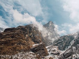 Preview wallpaper mountain landscape, peaks, fog, snow covered