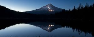 Preview wallpaper mountain, lights, lake, reflection, trees, night